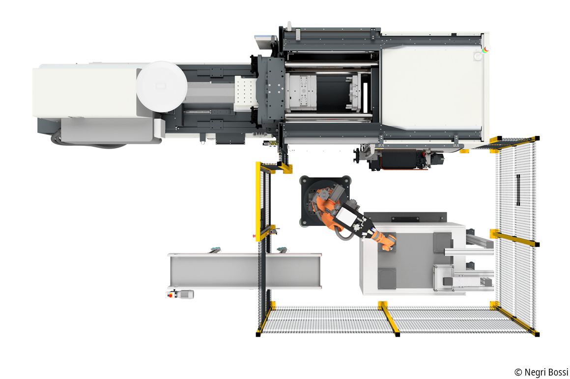 A robot places the injection-molded components on XPlanar movers, which then move under a camera for quality control.